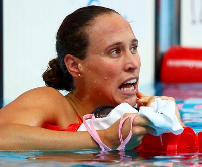 ウクライナ出身の競泳選手がロシアの国旗を踏みつけた写真投稿 国際連盟は 品位と尊厳を と呼びかけ ウクライナ出身の競泳選手がロシアの国旗を踏みつけた写真投稿 国際連盟は 品位と尊厳を と呼びかけ